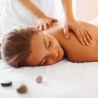 Massage therapy session focusing on upper back